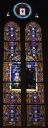 Ensemble des 8 verrières à personnages des baies 9 à 16 : Bon Pasteur, Saints Jean, Pierre, Paul, Jésus chez Marthe et Marie, Martyre de sainte Lucie, Sainte Famille, Transfiguration, ND de Lourdes, Sainte Anne d'Auray et verrière de la porte ouest
