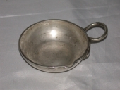 Goûte-vin utilisé comme coquille de baptême