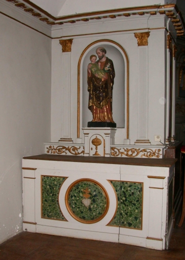 Ensemble de l'autel de saint Joseph et l'Enfant : autel, tabernacle, gradin d'autel, retable