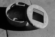 Réserve à eau baptismale, église paroissiale Saint-Yvon, Saint-Guy (Ploërdut)