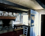 Ensemble : deux armoires, buffet et tableau de broderie